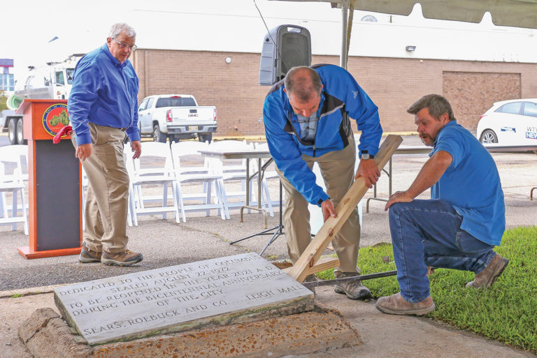 People digging up a time capsule