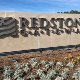 The main entrance sign to Redstone Gateway
